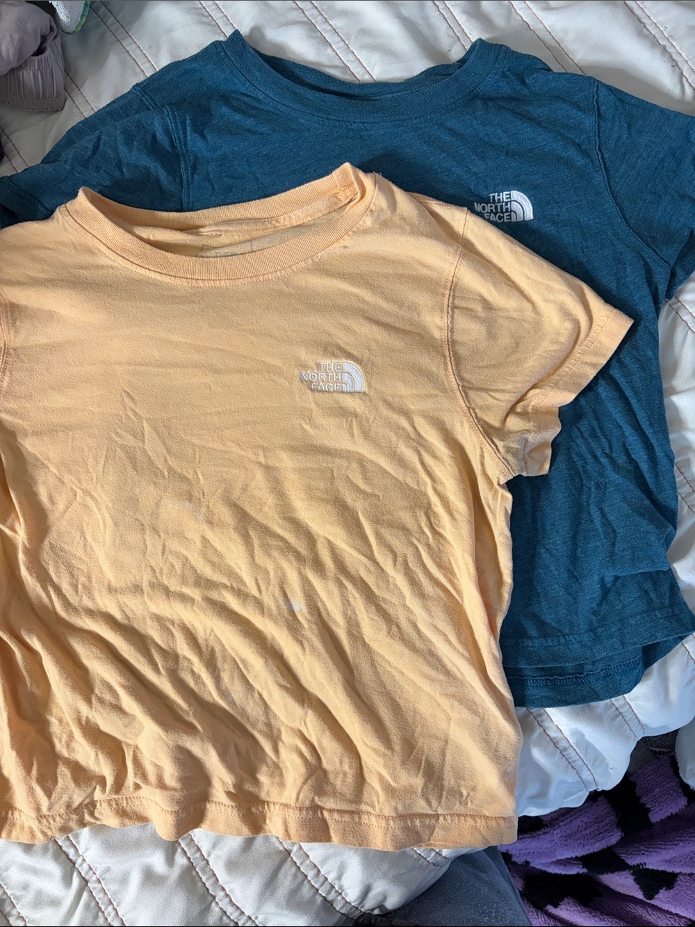 The North Face Short Sleeve Tees in Peach and Teal Blue